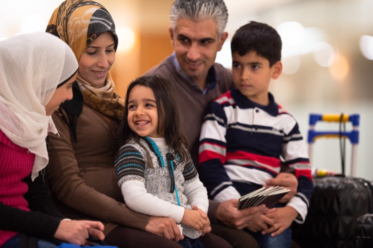 Happy Immigrant Family stock photo Rutger Heringa